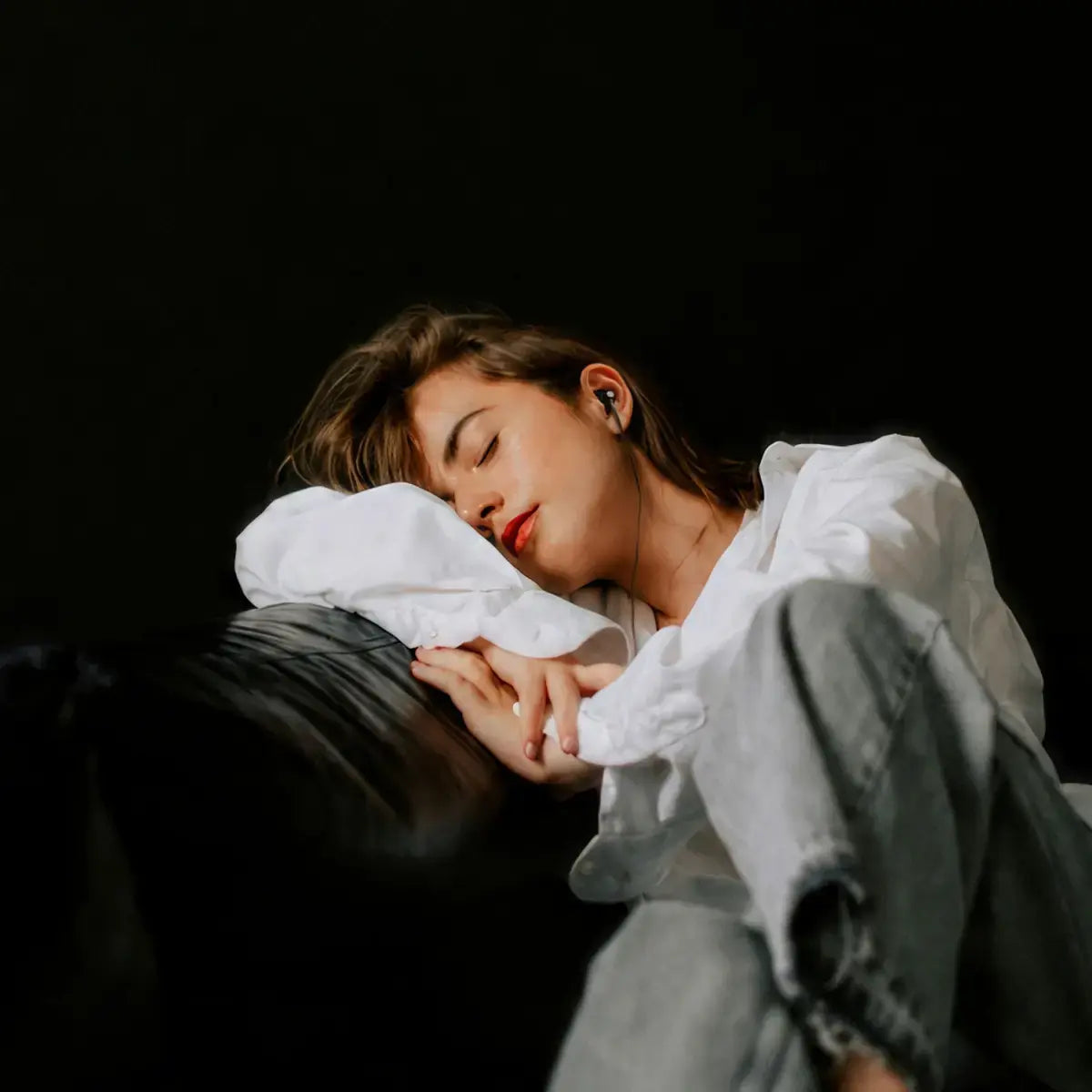 Person resting peacefully while exploring vagus nerve stimulation and nervous system wellness