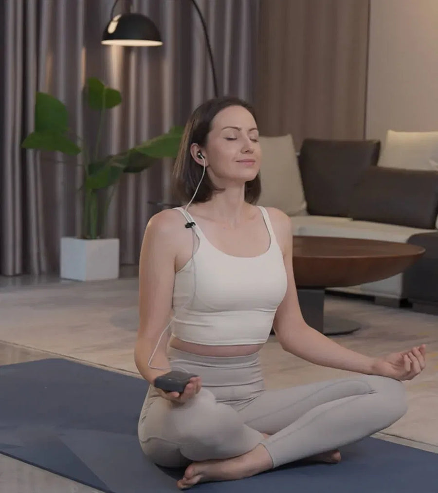 Person using ZenoWell Vita for meditation