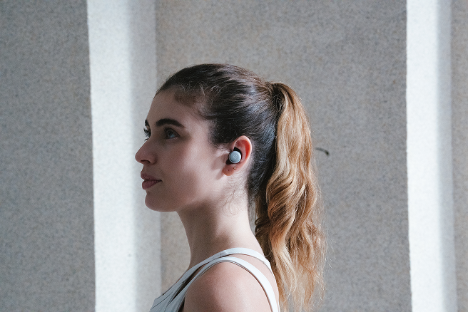 A woman wearing Zeno One in a quiet focused moment